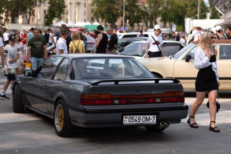 Blonde Woman Walking near Honda Prelude