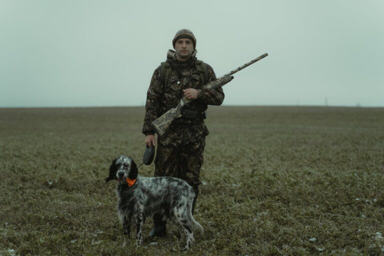 A Man Standing with His Dog