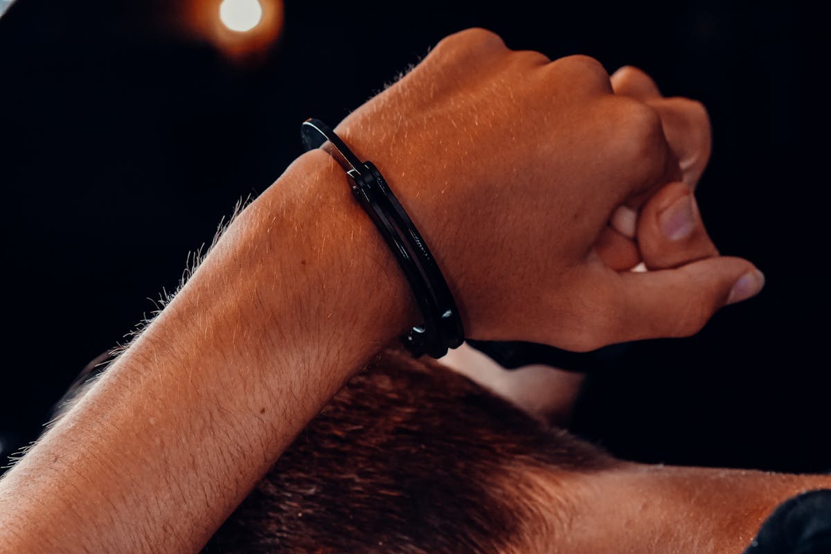 Hand of a Person with Handcuffs