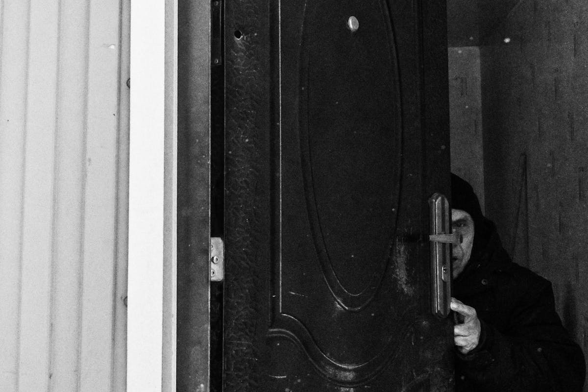 Man Behind the Open Door