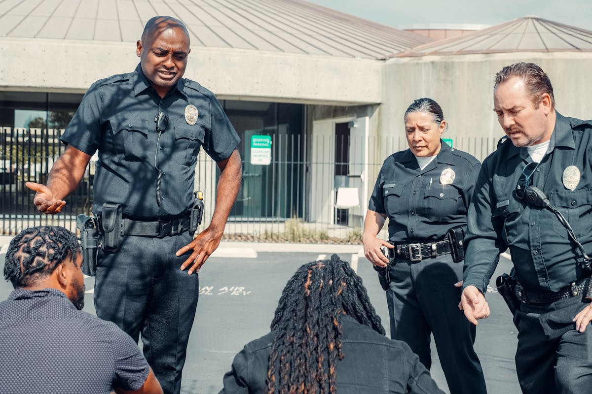 Two Police Officers Talking to a Men