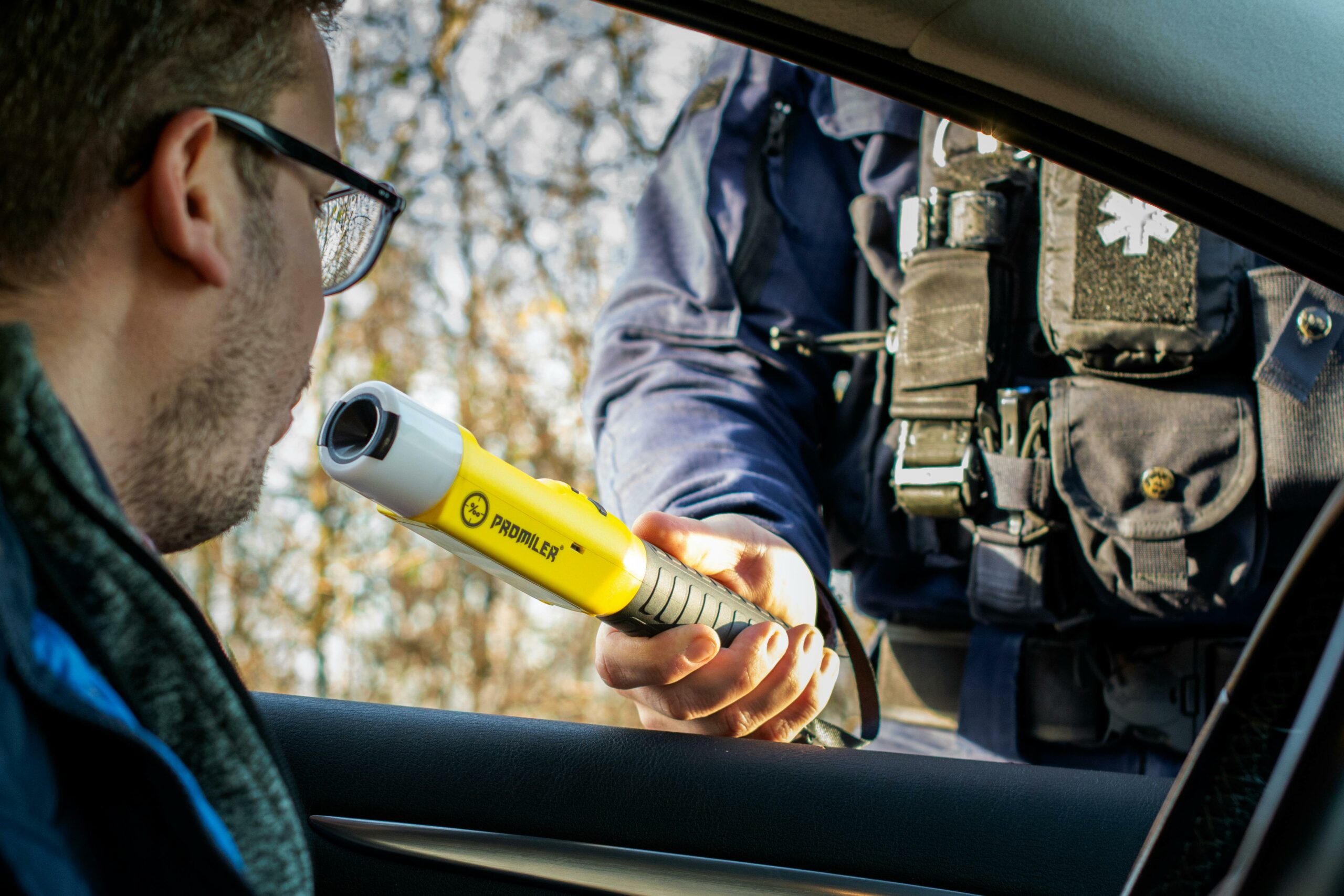 Police Officer During Breathalyzer Test at Traffic Stop